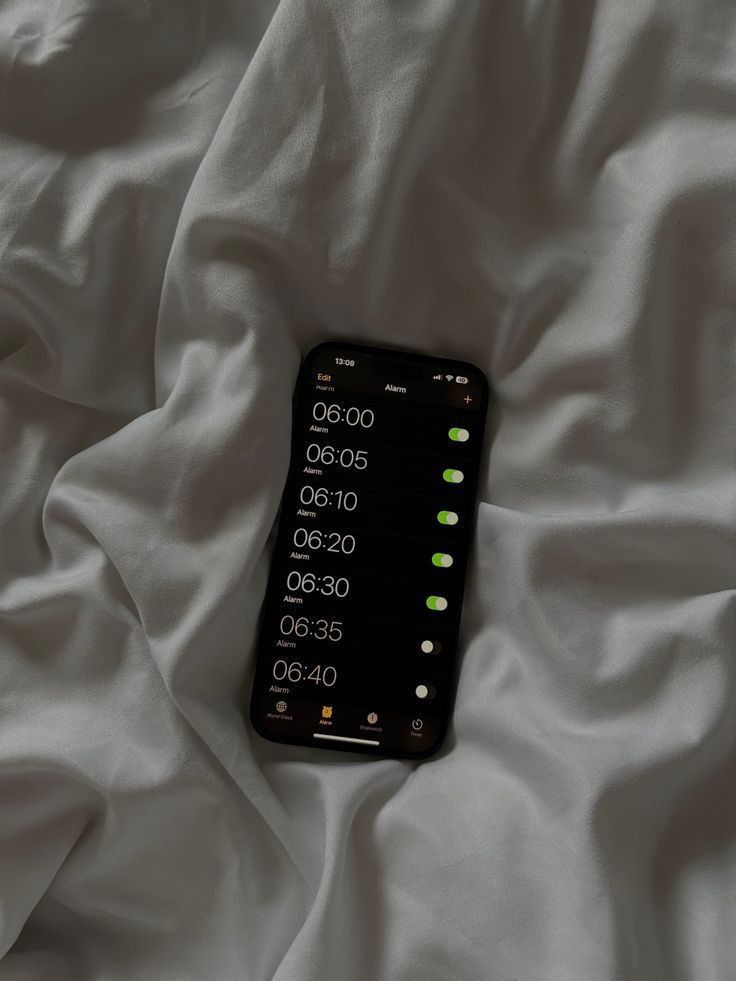 Phone showing a list of morning alarms